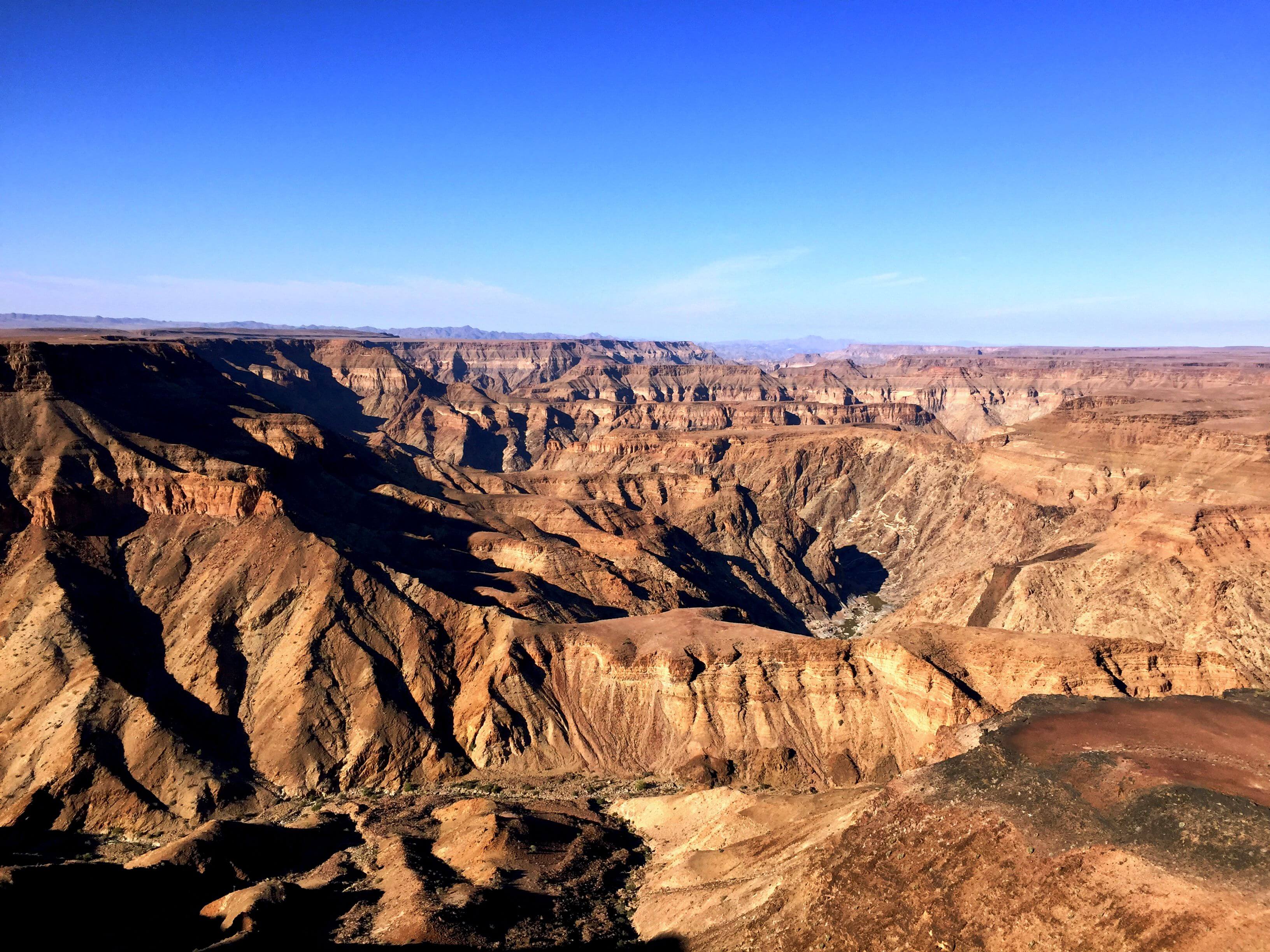A breathtaking view of Fish River Canyon vast and rugged landscape in Namibia
